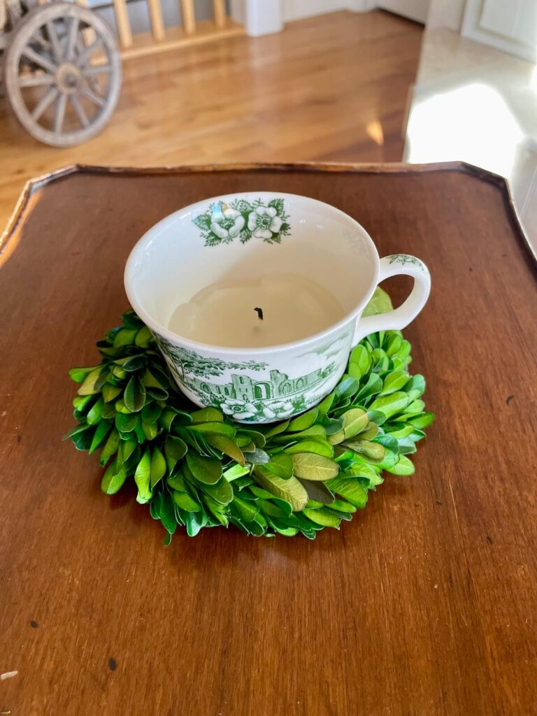 green tea cup with candle