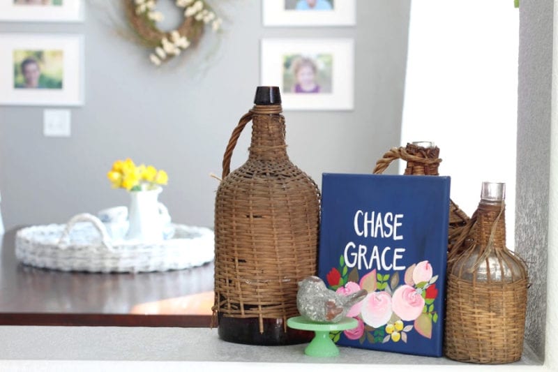 Chase Grace sign and wicker demi johns the perfect and practical Spring combo