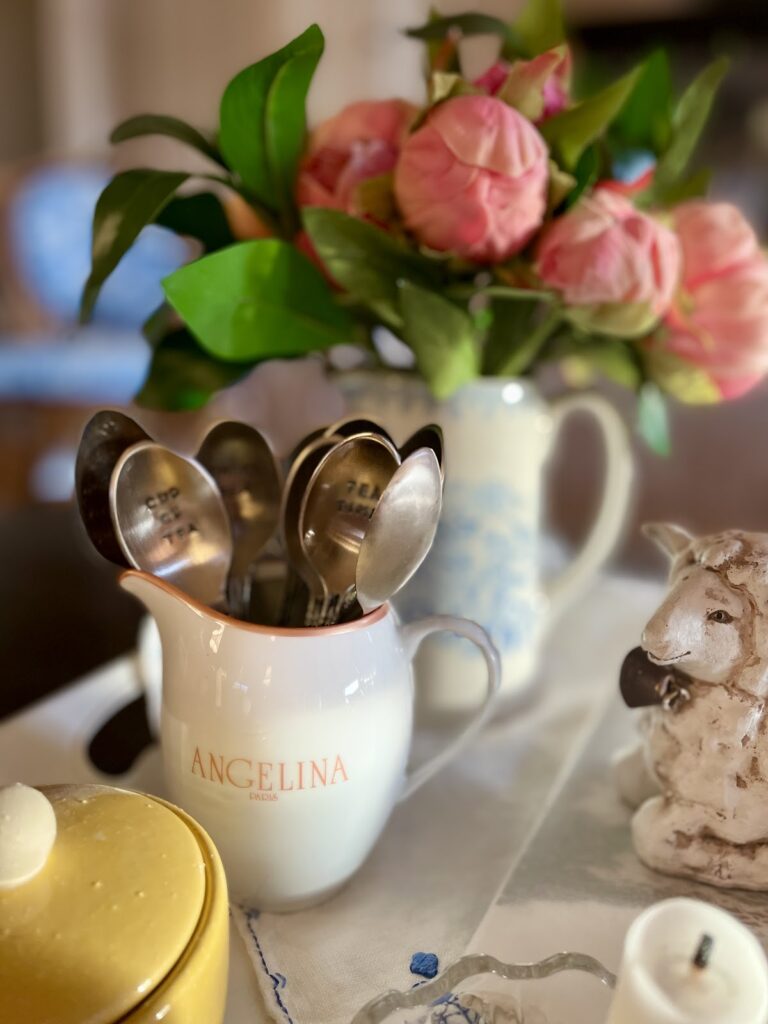 tea spoons in a pitcher