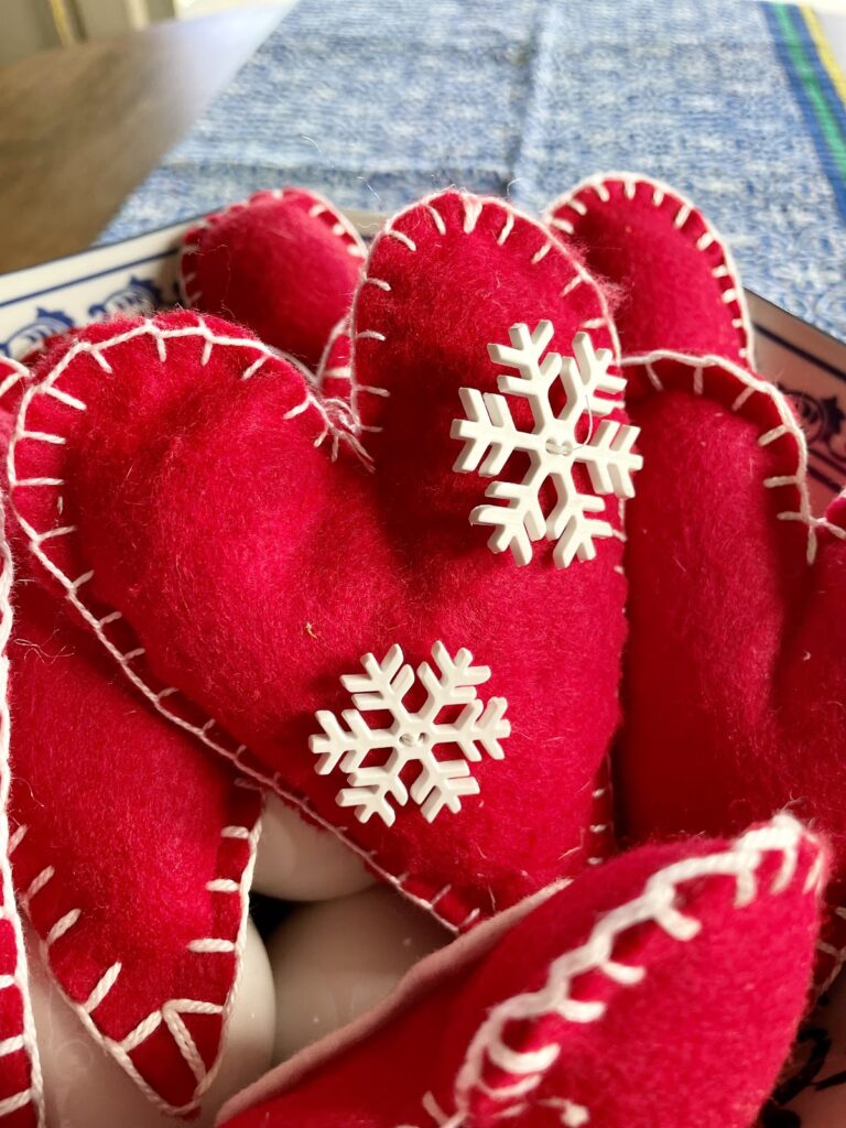 close up of felted hearts