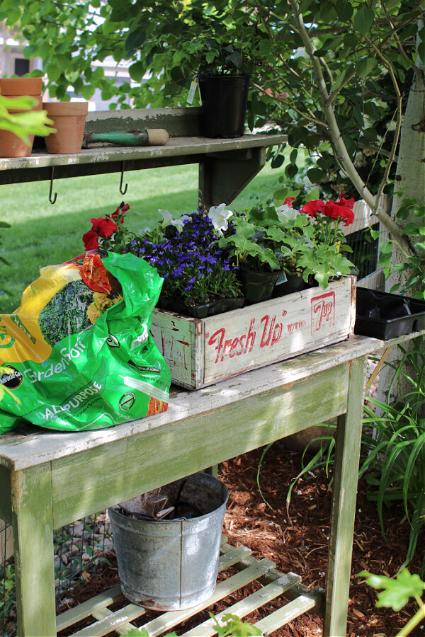 Our potting bench was so helpful for planting my summer flowers!