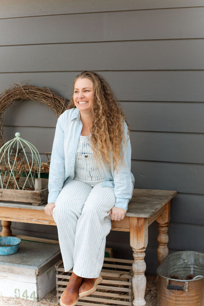 Kelly on her potting table thinking about the top 10 best sellers of 2024