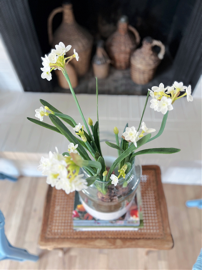 overhead view of faux paper white bulbs and flowers