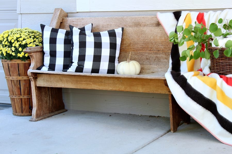 Simple tips and tricks for adding vintage decor to your Fall porch.